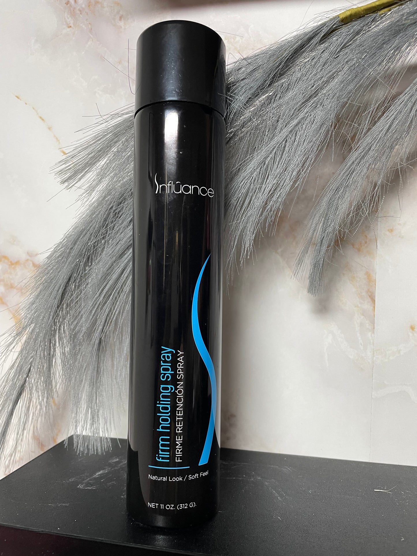 Firm holding spray