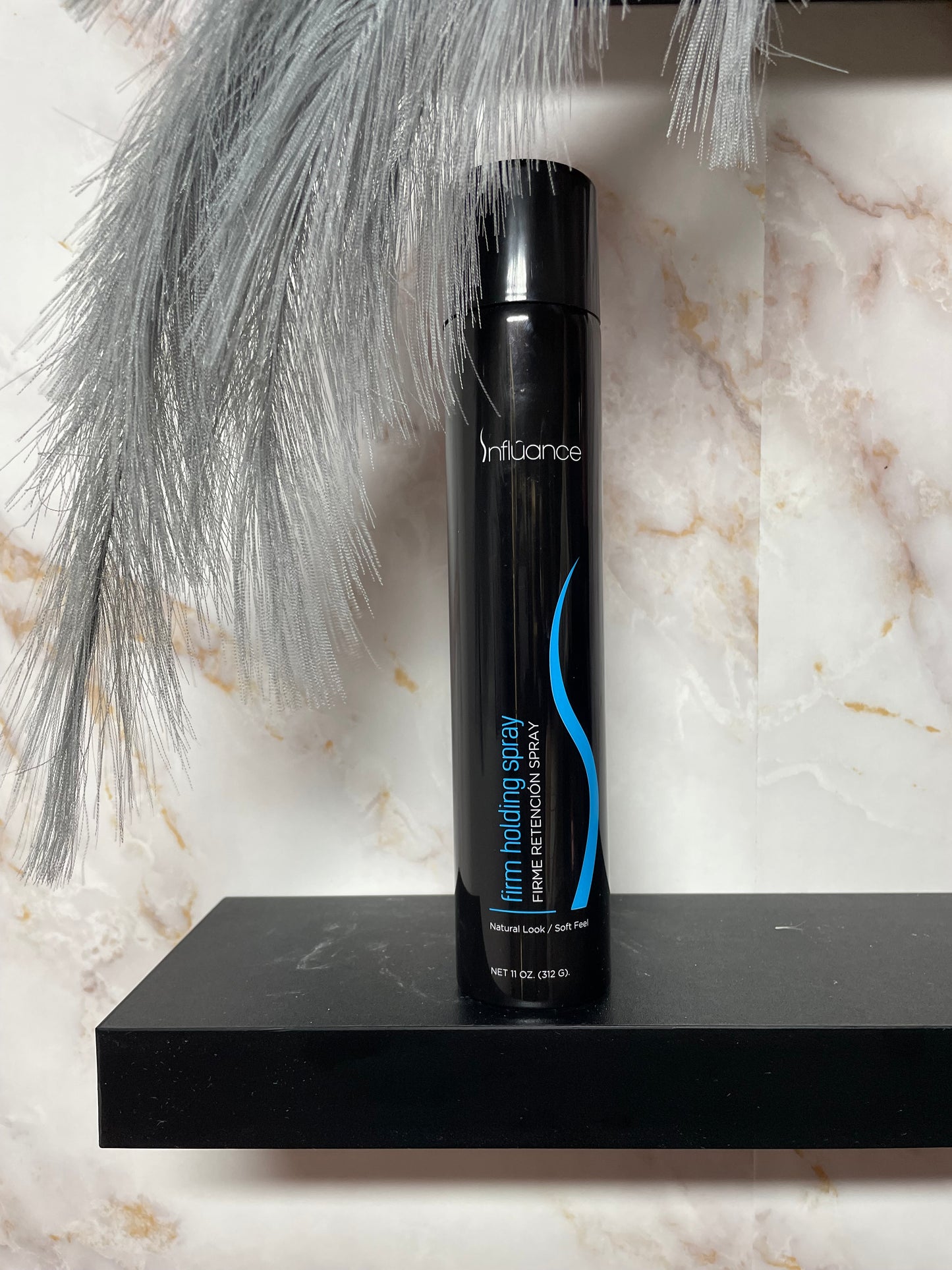 Firm holding spray